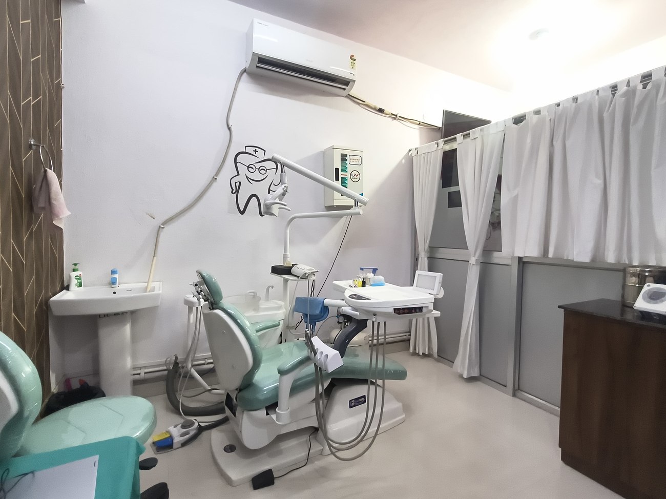 Treatment chair and dental unit
